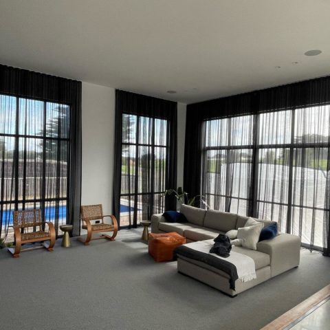 Sheer drapes and motorised blinds in a home in Barwon Heads.